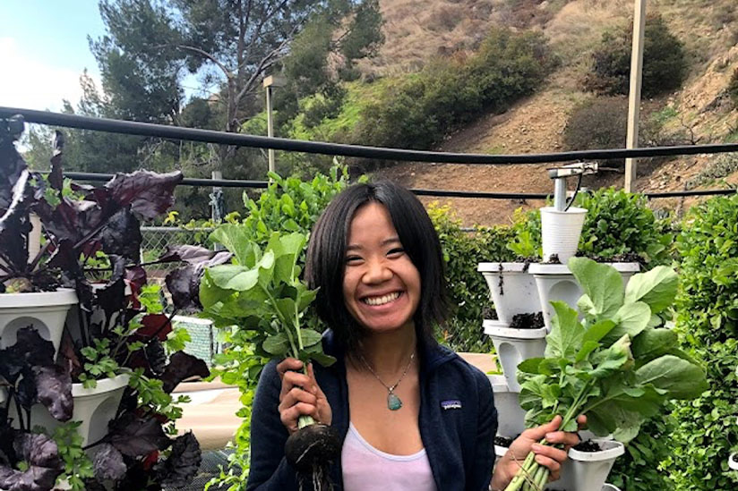 USC student, Erika Hang, in a sustainable garden